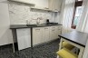 Bucatarie dintr-un apartament - Serenity Apartments and Studios