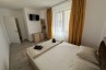 Camera dintr-un apartament - Serenity Apartments and Studios